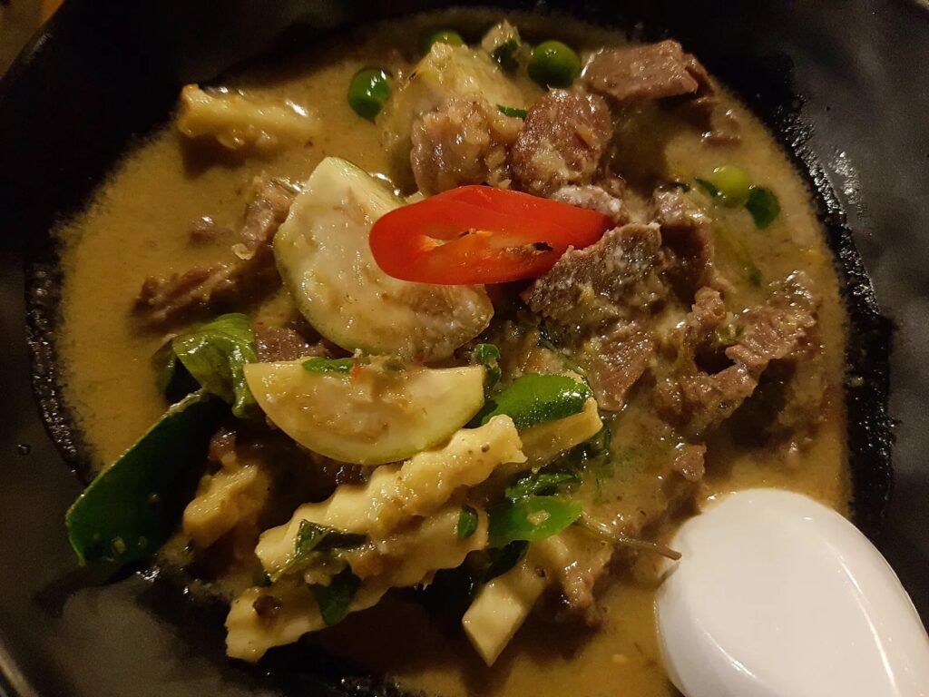 Beef green curry — representative Thai dish photo