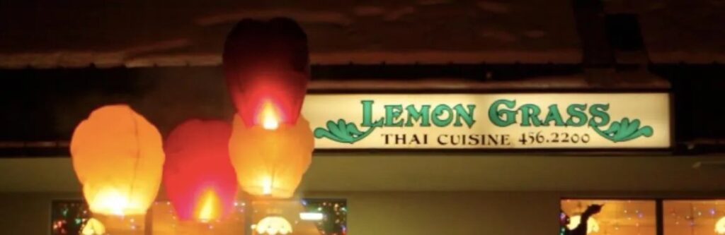 Illuminated Lemongrass Thai Cuisine storefront sign with sky lanterns in Fairbanks